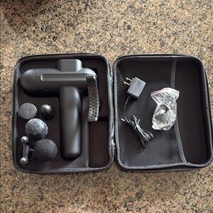 Black VR Headset with Accessories and Protective Case